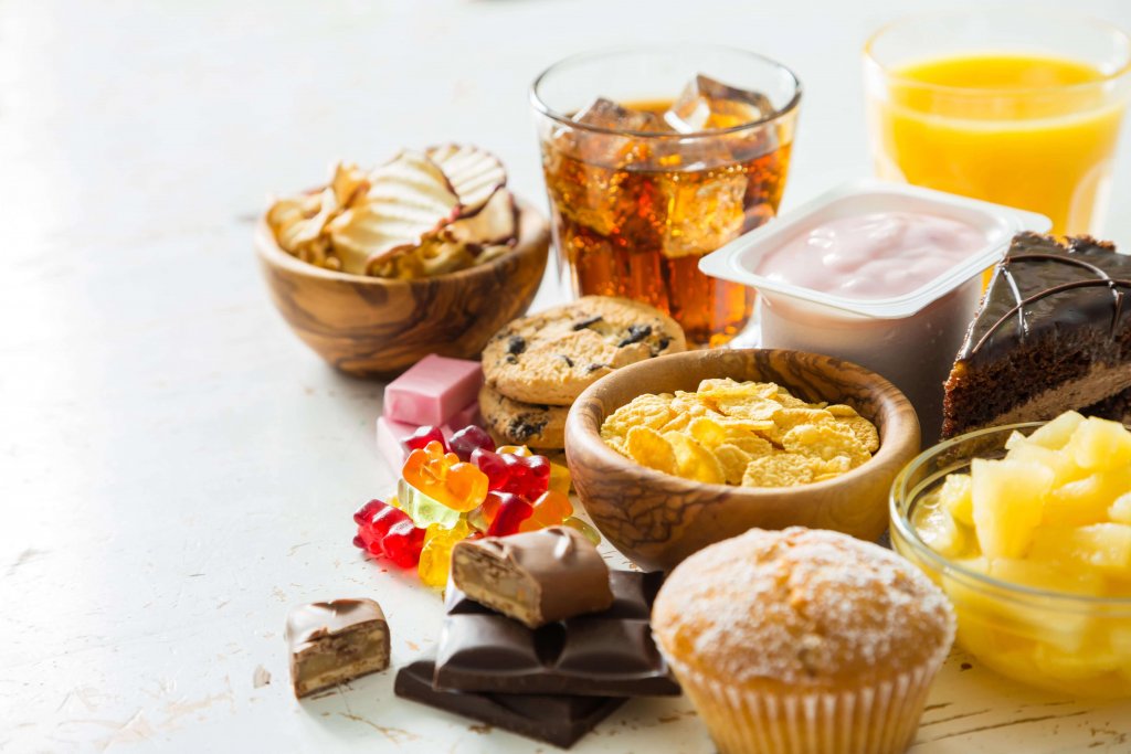 Unhealthy and processed foods: cereals, candy, cake, fizzy drinks.
